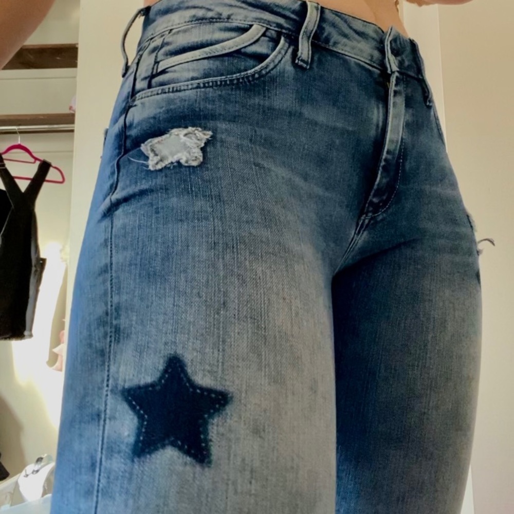 Star patched mid rise skinny jeans